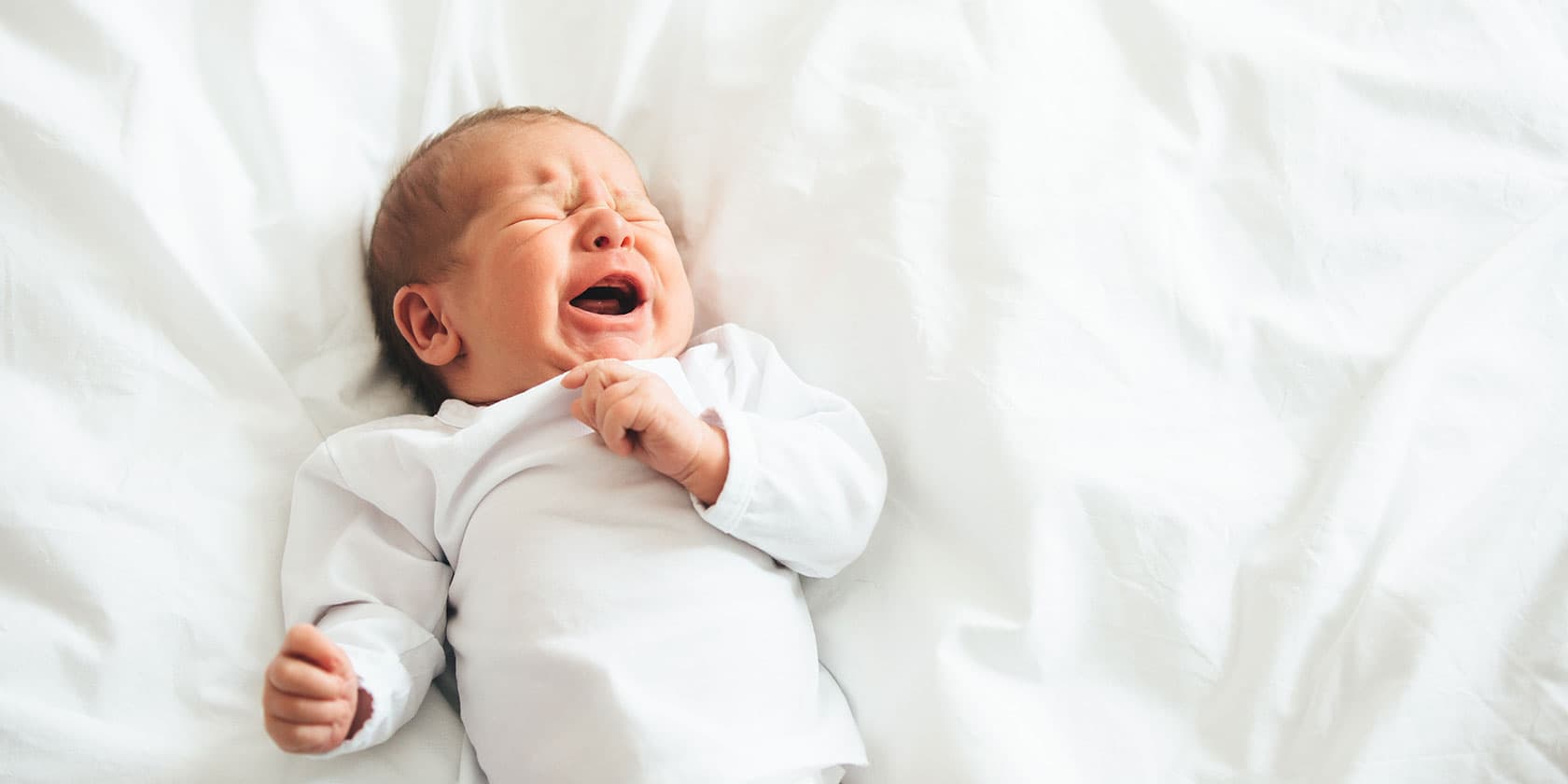Bébé a 15 mois : jeux, pleurs et période crampon